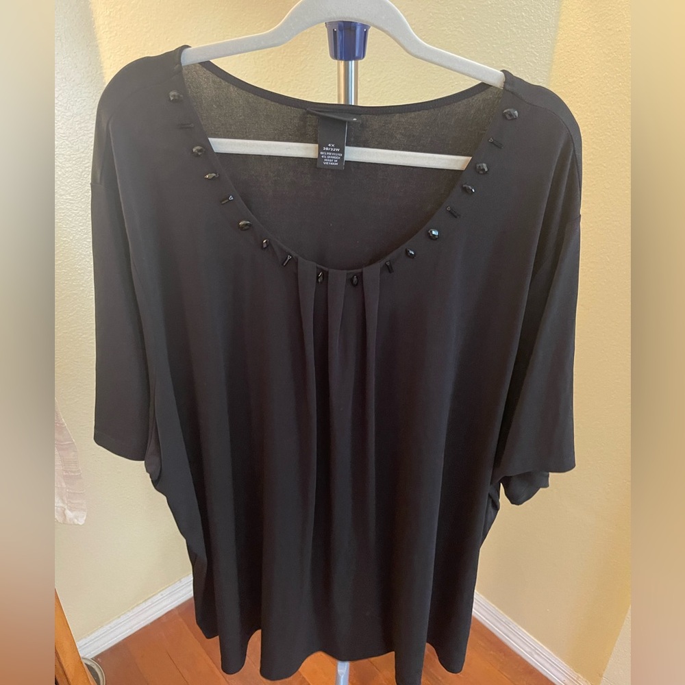 Maggie Barnes – black blouse